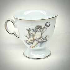 Trisa Porcelain Demitasse Teacup Cherubs Vintage TRSTRS21