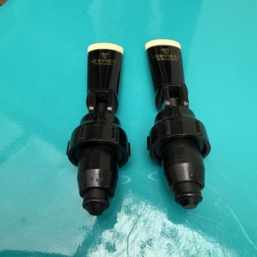 Two used black guinness - used,