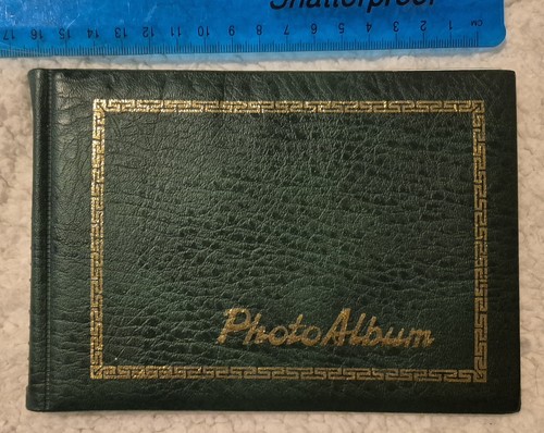 Dark green flip photo - dark, album