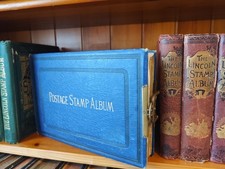 Old stamp album,,Lincoln,,(Grandfather's collection)Cat 15,000-20,000 pounds.