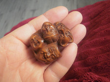 Hand Carved wood netsuke of 7