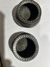 2 Small Silver Embossed Dishes
