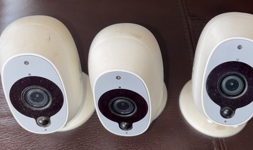 Three swann security cameras - three,