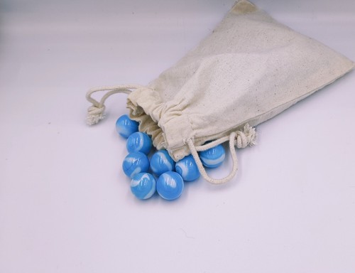 Round glass marbles - 33, cloth