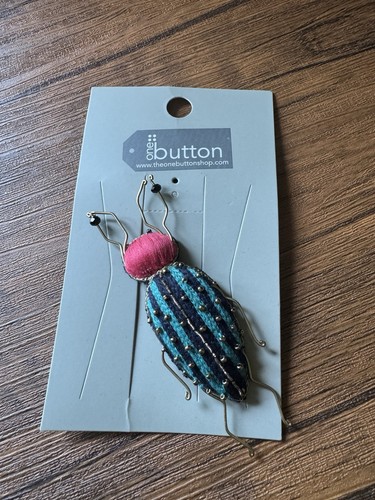 One button brand beetle - brand, brooch
