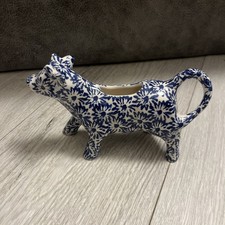Blue Daisy Cow Creamer Hand
