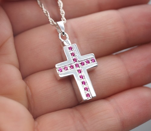 Cross with red gemstones - with,