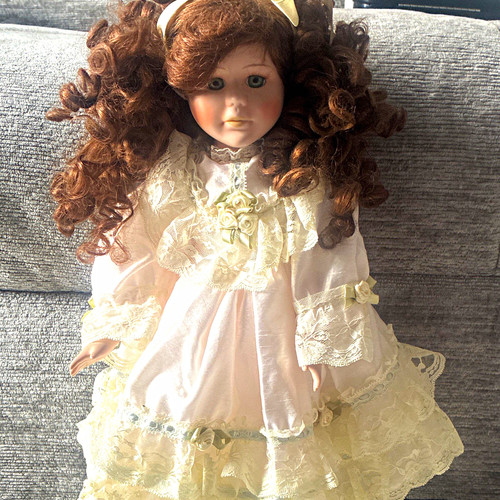 Porcelain girl doll brown - doll,