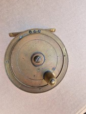 Vintage brass fishing reel
