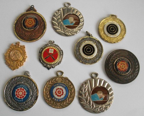 Old shooting medals all - old,