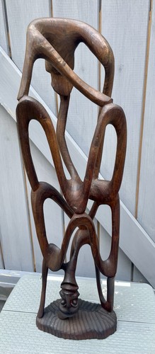 Tall hand carved shetani - hand,