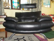 Danish design modern black leather statement armchair  v g c  rrp . £2550