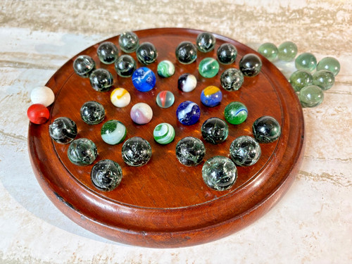 Marble solitaire game very old - solitaire,