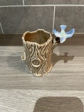 Wade Tree Trunk and Blue Bird