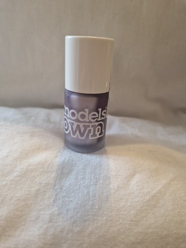 Models own nail polish - nail, mauve