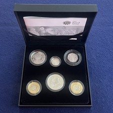 2009 silver proof family coin - silver,