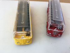 Two Buses with Clear Top and