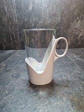 Vintage 1960s Arcoroc glass mug with a Ligy blue plastic holder