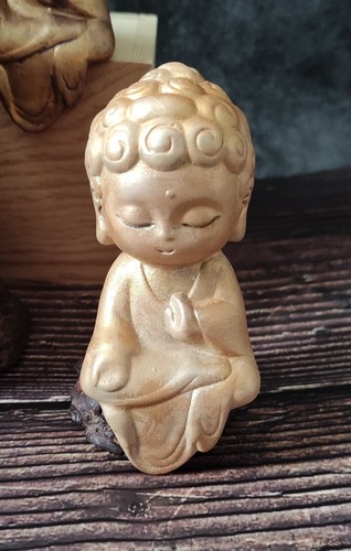 Pale gold buddha statue hand - gold,