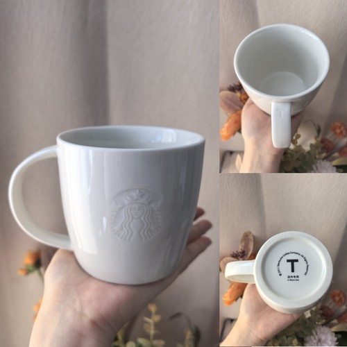 Starbucks cup embossed - cup,