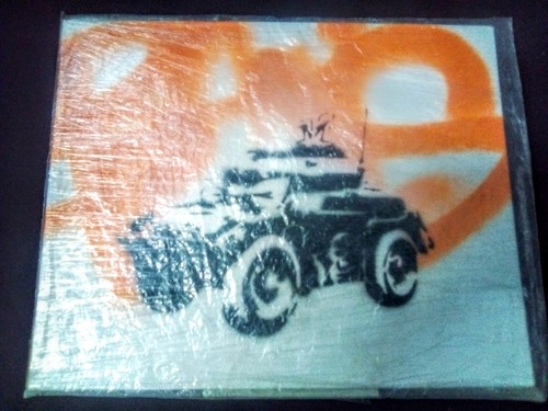 Banksy armored car with bow - banksy,