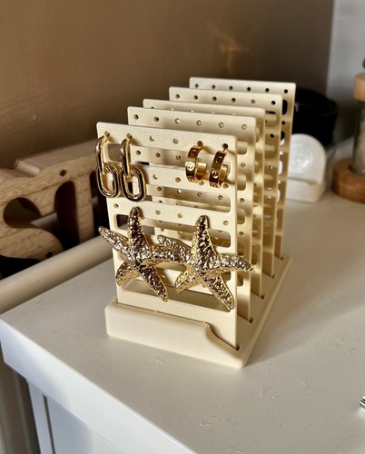 Cream earring display - , show
