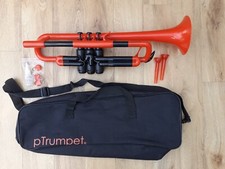 pTrumpet red plastic trumpet with mouthpieces, valve oil, valve extenders & case