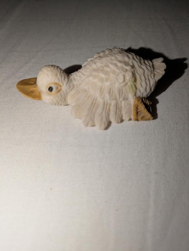 Goose lying down figurine - goose,