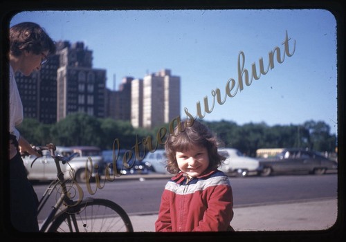Woman girl bicycle cars - woman, 35mm