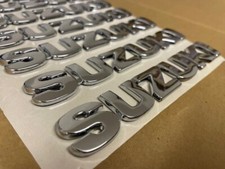 SUZUKI GENUINE Chromed Rear Badge / Emblem-Fits All Suzuki-Brand NEW & UNUSED