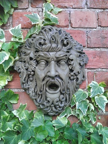 Stone garden god - god, face