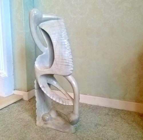 Stunning abstract carving of - a,