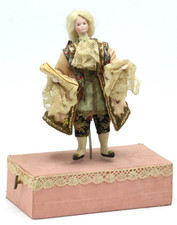 ANTIQUE DOLL VENDING MACHINE