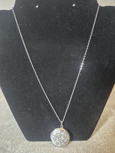 Silver colour round - colour, locket