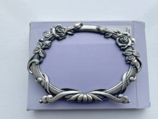 Oval metal picture frame from