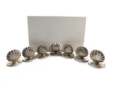 SET OF SEVEN MENU HOLDERS IN SHELL FORM HALLMARKED LONDON 1994 REF 411