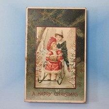 Embossed Postcard C1910 Christmas Snow Toboggan Fur Muff Greetings