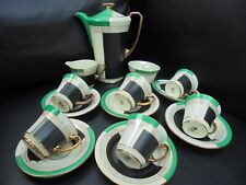 A Crown Devon coffee set with