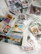 50 packets of mostly modern  stamps . Worldwide minus USA and Europe