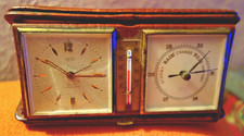Vintage Smiths 15 jewel travel clock and weather station in leather case