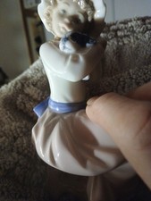 Lladro Nao Girl Holding Her