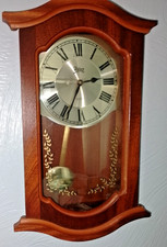 ABBEY small quartz wooden wall clock with chiming & a long swinging pendulum.
