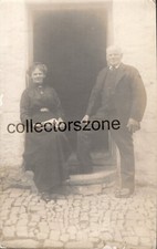 1914 Elderly Couple Outside