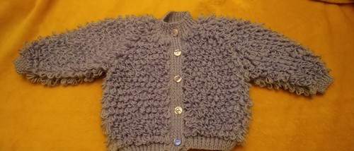 Baby toddler hand - hand, knitted