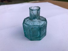 Late Victorian crude handmade glass ink bottle with many air bubbles