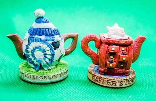 Two tetley resin - tetley, pots