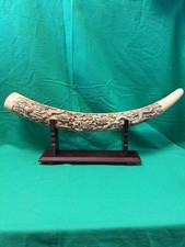 Faux Tusk With Dragon Carvings