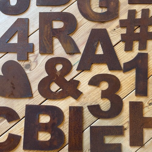 Rusty metal letters signs - metal,