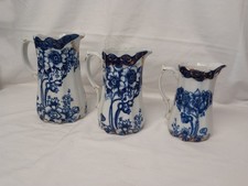 Three Blue and White Ringtons Tea Merchants Jugs