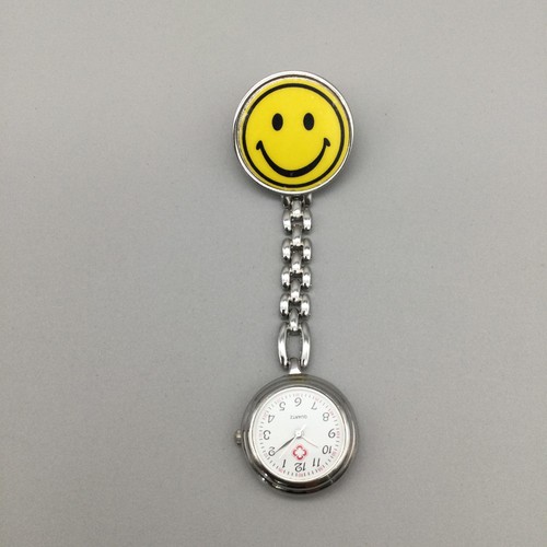 Smiley face nurse brooch - face,